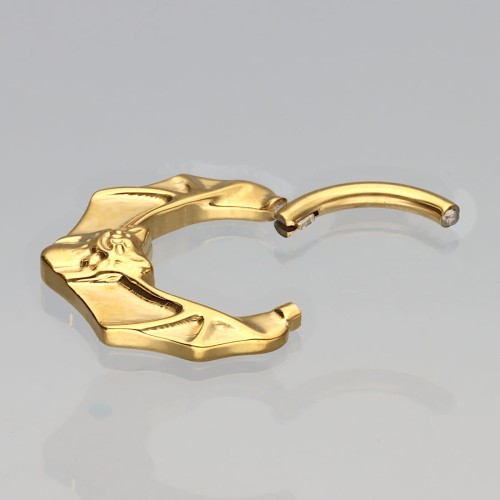 Złoty clicker tytanowy z motywem nietoperza