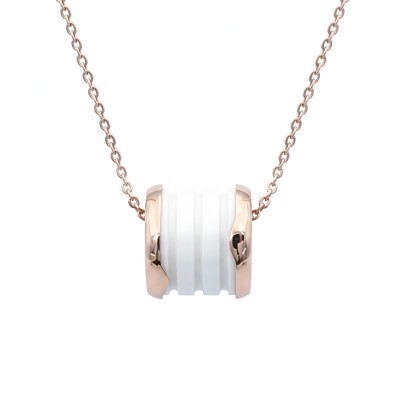 Naszyjnik rose gold z koralikiem z białej ceramiki.jpg