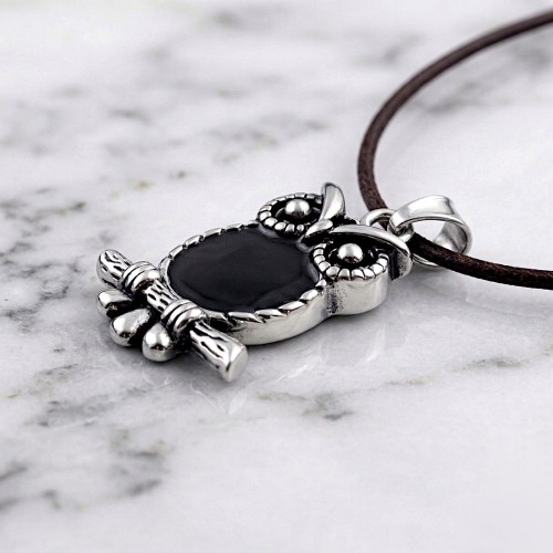 Srebrna zawieszka ze stali w kształcie SOWY.jpg