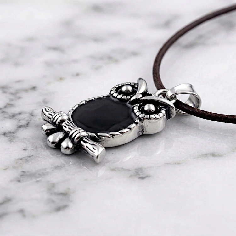 Srebrna zawieszka ze stali w kształcie SOWY.jpg