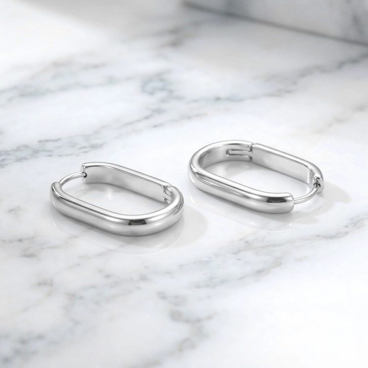 Owalne kolczyki huggie ze stali.jpg