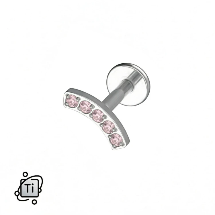 Labret tytanowy z łukiem z różowych kryształków.jpg