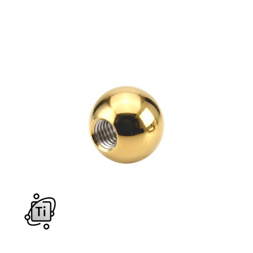 Złota nakrętka z tytanowa na pręty z gwintem zewnętrznym.