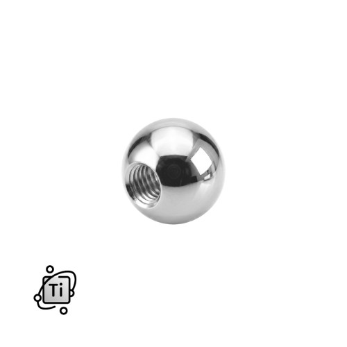 Srebrna nakrętka z tytanowa na pręty z gwintem zewnętrznym.