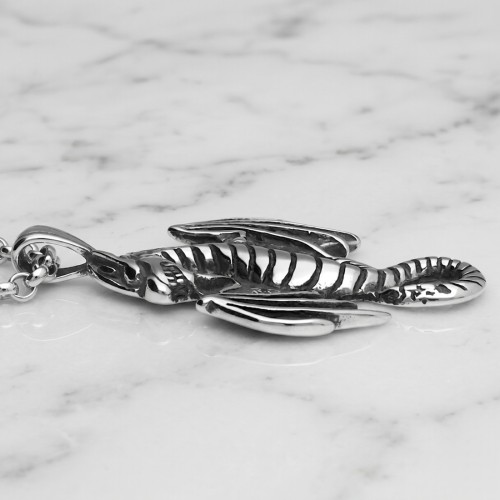 Stalowa zawieszka w kształcie smoka ze skrzydłami