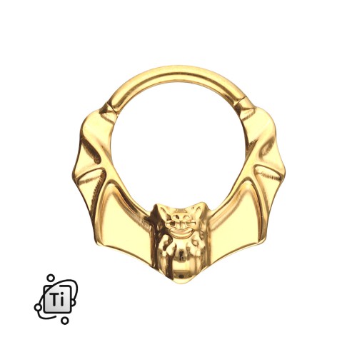 Złoty clicker tytanowy z motywem nietoperza
