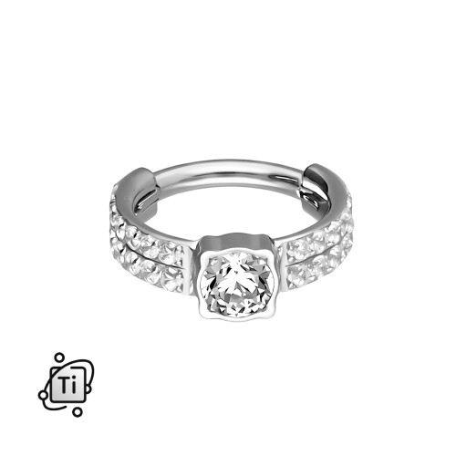 Tytanowy clicker z centralną cyrkonią i podwójnym rzędem kamieni