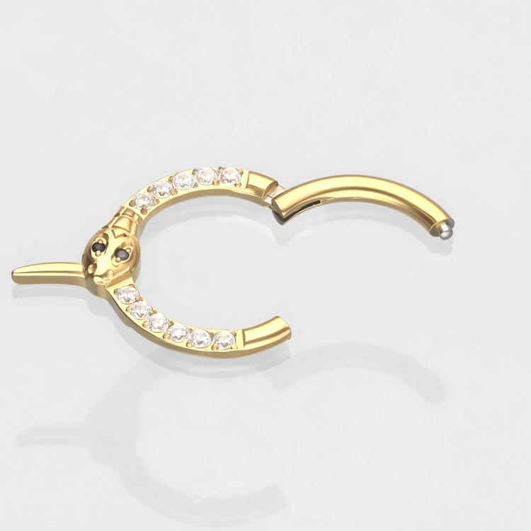 Złoty tytanowy clicker z cyrkoniami i motywem węża