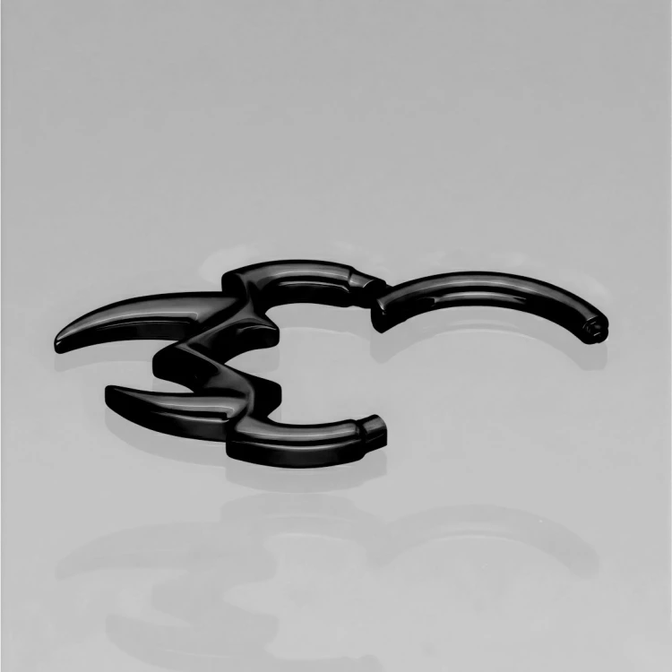 Czarny tytanowy clicker z motywem kłów