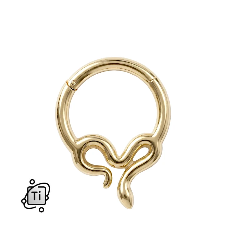 Złoty clicker z tytanu z wężowym motywem