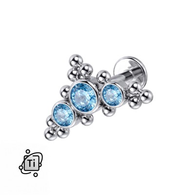 Labret ornamentowy z tytanu w formie łuku z 3 błękitnymi cyrkoniami i kulkami