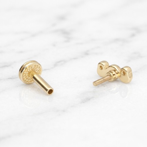 Labret ze złota 14K w formie fali z trzema cyrkoniami